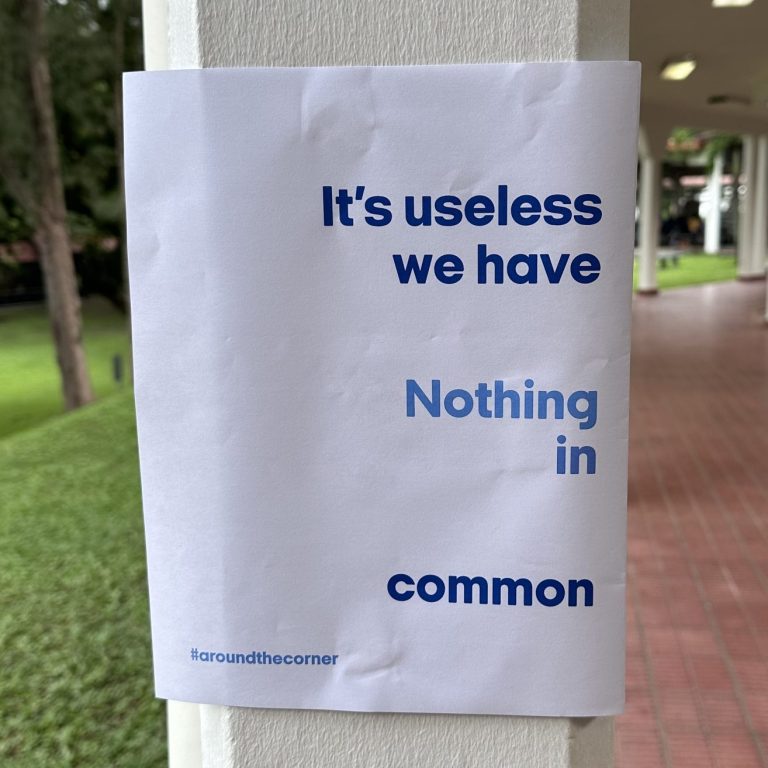 A poster that read "it's useless we have nothing in common."