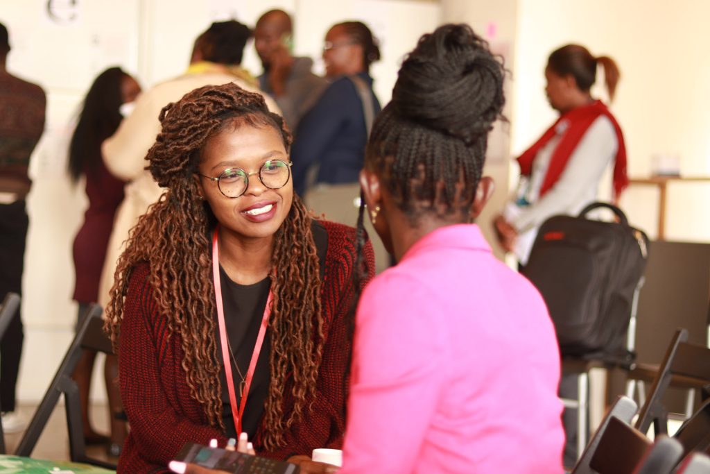 Two women talking during the Idea Lab workshop